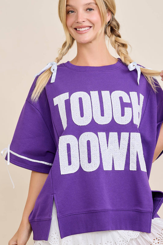TOUCHDOWN Eyelet Appliqué Pullover Top