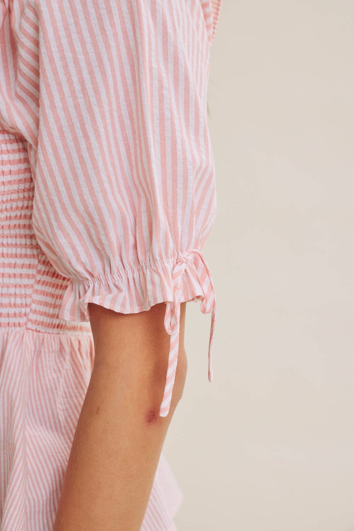 SOFT BREEZE RUFFLE SMOCKED STRIPE PEPLUM BLOUSE WITH BOW